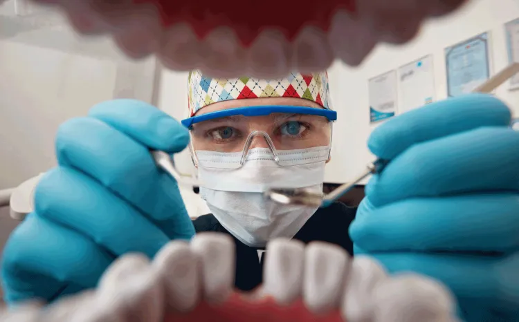 Dentist working on teeth