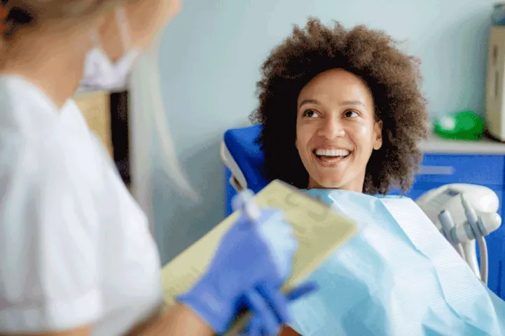 woman smiling at the dentist