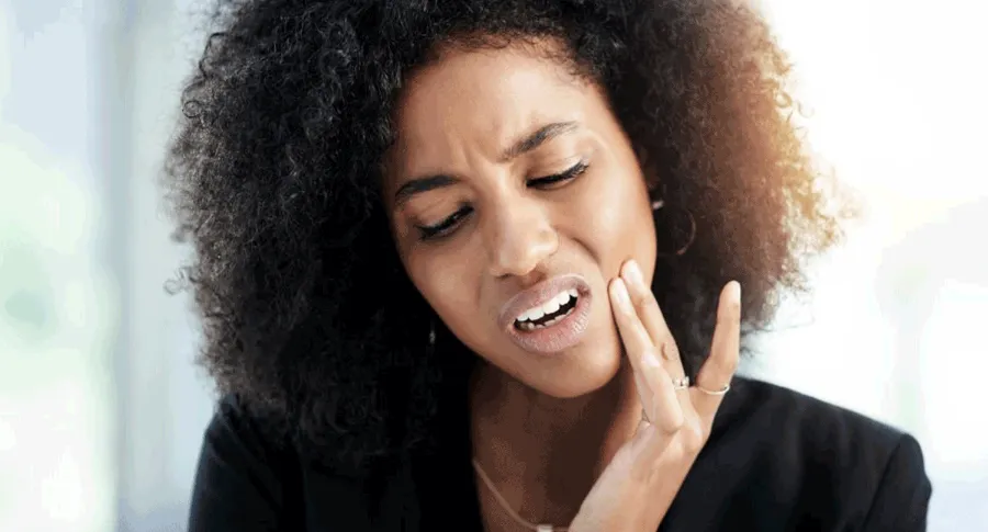 Black woman with tooth ache