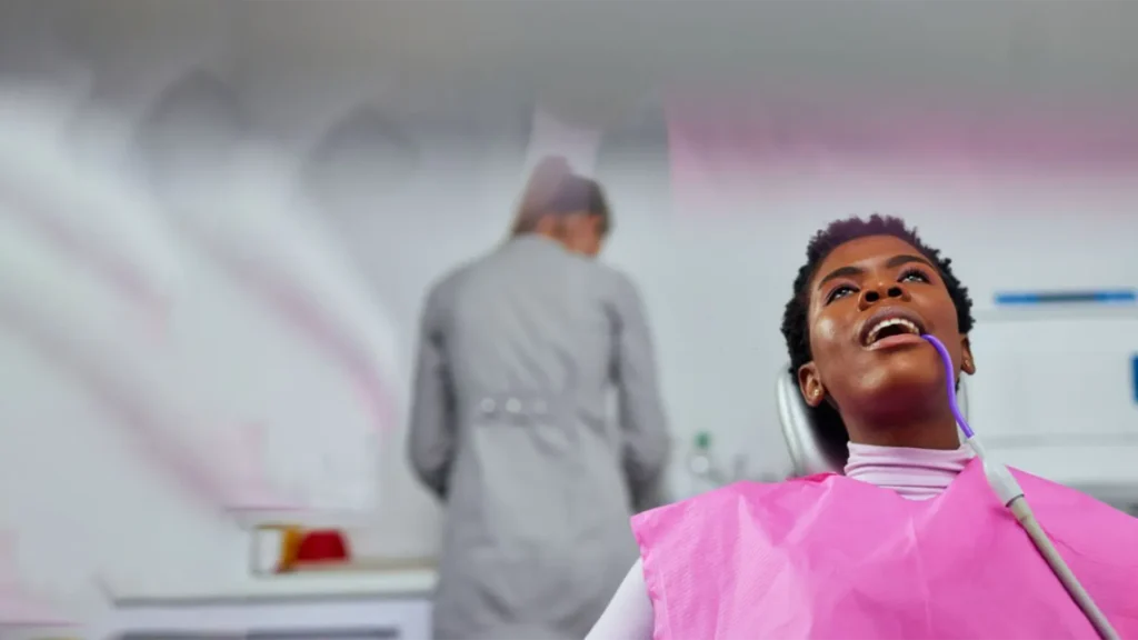 Black woman getting root canal therapy